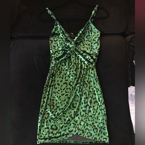 Green and black velvet leopard print mini dress.